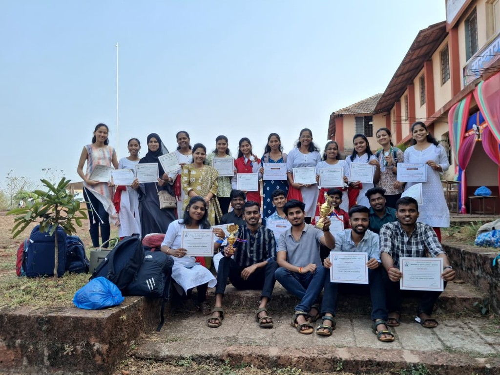 DLLE students with certificates and trophies